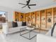 Comfortable living room featuring built-in bookshelves and bright natural light at 1836 E Turquoise Ave, Phoenix, AZ 85020