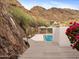 Beautiful outdoor pool surrounded by desert landscape and majestic mountains at 1836 E Turquoise Ave, Phoenix, AZ 85020
