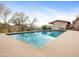 Sparkling pool surrounded by desert landscape, providing a tranquil retreat at 1836 E Turquoise Ave, Phoenix, AZ 85020