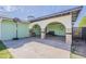 Covered patio with tiled floor and an outdoor basketball hoop at 1838 E 2Nd Pl, Mesa, AZ 85203