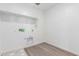 Utility hookups in a laundry room, showcasing practical home amenities at 18456 W Monte Lindo Ln, Surprise, AZ 85387