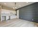 Stylish room with custom cabinets, stainless steel dishwasher, and a modern light fixture at 18624 W Cathedral Rock Dr, Goodyear, AZ 85338