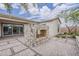 Charming outdoor fireplace with stone finish on a paved patio, great for entertaining at 18624 W Cathedral Rock Dr, Goodyear, AZ 85338