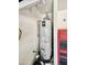 Garage with water heater installed on wall at 1950 E Dust Devil Dr, San Tan Valley, AZ 85143
