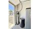 View of the garage featuring a water filtration system and epoxy flooring at 1950 E Dust Devil Dr, San Tan Valley, AZ 85143