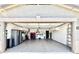Spacious garage with epoxy flooring, lots of storage, and a clean, organized appearance at 1950 E Dust Devil Dr, San Tan Valley, AZ 85143