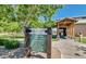 Beautiful Recreation Center entrance with lush landscaping, sign, and covered entry way at 1950 E Dust Devil Dr, San Tan Valley, AZ 85143