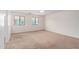 Primary bedroom featuring carpet floors and windows with views of the outside at 1950 N Center St # 115, Mesa, AZ 85201