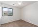 Cozy bedroom featuring a window and neutral carpet flooring at 1950 N Center St # 115, Mesa, AZ 85201