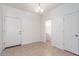 Bright dining room with neutral tile floors and access to the powder room and front door at 1950 N Center St # 115, Mesa, AZ 85201