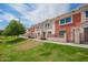 Beautiful townhouse complex with well-maintained landscaping, perfect for outdoor enjoyment at 1950 N Center St # 115, Mesa, AZ 85201