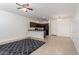 Open-concept living area with tile flooring, modern kitchen, and plenty of natural light at 1950 N Center St # 115, Mesa, AZ 85201