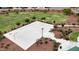 Community basketball court surrounded by lush landscaping and walking paths at 19814 W Buchanan St, Buckeye, AZ 85326