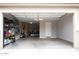 Spacious two-car garage with ample storage, shelving, and a clean, well-lit interior at 19814 W Buchanan St, Buckeye, AZ 85326