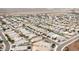 An aerial view of a vibrant neighborhood with neatly planned streets and homes at 19814 W Buchanan St, Buckeye, AZ 85326