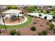 A community playground with a sun shade with easy access to walking paths at 19814 W Buchanan St, Buckeye, AZ 85326