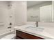 Bathroom featuring modern fixtures, tub, and a tiled shower at 2000 N 36Th St # 29, Phoenix, AZ 85008