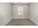 Bedroom featuring carpet flooring and a window for natural light at 2000 N 36Th St # 29, Phoenix, AZ 85008