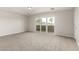 Bright bedroom with a sliding glass door offering a view at 2000 N 36Th St # 29, Phoenix, AZ 85008