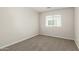 This room has a plush carpet and window for natural light at 2000 N 36Th St # 29, Phoenix, AZ 85008