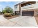 Charming two-story home with a stone facade, private balcony, and well-manicured front yard at 2000 N 36Th St # 29, Phoenix, AZ 85008