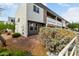 Attractive multi-story townhome with stone accents and a well-maintained landscaped yard at 2000 N 36Th St # 29, Phoenix, AZ 85008