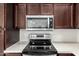 The kitchen featuring stainless steel appliances and sleek countertops at 2000 N 36Th St # 29, Phoenix, AZ 85008