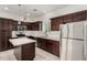 Modern kitchen with stainless appliances, center island, and plenty of storage at 2000 N 36Th St # 29, Phoenix, AZ 85008
