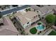 The property features a private pool, spacious backyard, and well-maintained landscaping at 21472 E Saddle Ct, Queen Creek, AZ 85142