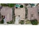 Overhead view of a house with a private backyard pool in a quiet residential neighborhood at 21472 E Saddle Ct, Queen Creek, AZ 85142