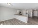 Kitchen featuring stainless steel appliances, white cabinets, and granite countertops at 255 W Dewey Ave, Coolidge, AZ 85128