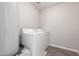 Laundry room with a modern washing machine and dryer at 255 W Dewey Ave, Coolidge, AZ 85128