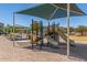Neighborhood playground with canopy and picnic area at 255 W Dewey Ave, Coolidge, AZ 85128