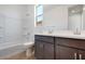 Bathroom showcasing a modern vanity, toilet and shower/tub combination at 25616 N 148Th Dr, Surprise, AZ 85387