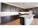 Well-equipped kitchen featuring ample cabinetry, modern appliances, and a bright white island at 25616 N 148Th Dr, Surprise, AZ 85387