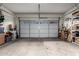 Spacious garage with a large sectional door and ample room for storage at 26145 W Runion Dr, Buckeye, AZ 85396