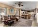 Open-concept living room offering seamless flow to the kitchen and dining area at 26145 W Runion Dr, Buckeye, AZ 85396