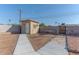 Spacious backyard with a storage shed, block fencing, and potential for outdoor activities at 2625 N 40Th Dr, Phoenix, AZ 85009