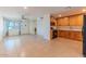 Open-concept living area with tile flooring seamlessly connecting to the kitchen space at 2625 N 40Th Dr, Phoenix, AZ 85009