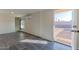 Bright living area with tile flooring and natural light, offers access to outdoor space at 2625 N 40Th Dr, Phoenix, AZ 85009