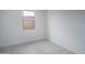 This is a secondary tile floor bedroom that features natural light from a window with neighborhood views at 2823 N 212Th Dr, Buckeye, AZ 85396