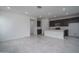 Bright and airy living room with recessed lighting, ceramic tile flooring, and an open concept layout at 2823 N 212Th Dr, Buckeye, AZ 85396