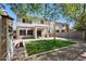 Backyard with play area, pergola, and artificial turf at 2851 W Gold Dust Ave, San Tan Valley, AZ 85144