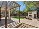 Backyard featuring a basketball hoop, playhouse, fire pit, and trees at 2851 W Gold Dust Ave, San Tan Valley, AZ 85144