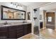 Bathroom with double sink vanity, granite countertop, and access to a walk-in closet at 2851 W Gold Dust Ave, San Tan Valley, AZ 85144