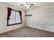 Bedroom with a brick wall, a ceiling fan, and a window at 2851 W Gold Dust Ave, San Tan Valley, AZ 85144