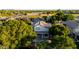 Overhead view of a home with a pool, a covered patio, and lush greenery at 288 W Los Alamos St, Gilbert, AZ 85233