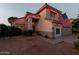 Inviting two-story home featuring desert landscaping, a tile roof, and an American flag to show pride in ownership at 288 W Los Alamos St, Gilbert, AZ 85233