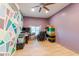 Charming office space featuring colorful accent wall, ceiling fan, and great natural light at 288 W Los Alamos St, Gilbert, AZ 85233