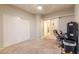 Office space features French doors, carpet, closet space, and neutral paint in this interior home view at 288 W Los Alamos St, Gilbert, AZ 85233